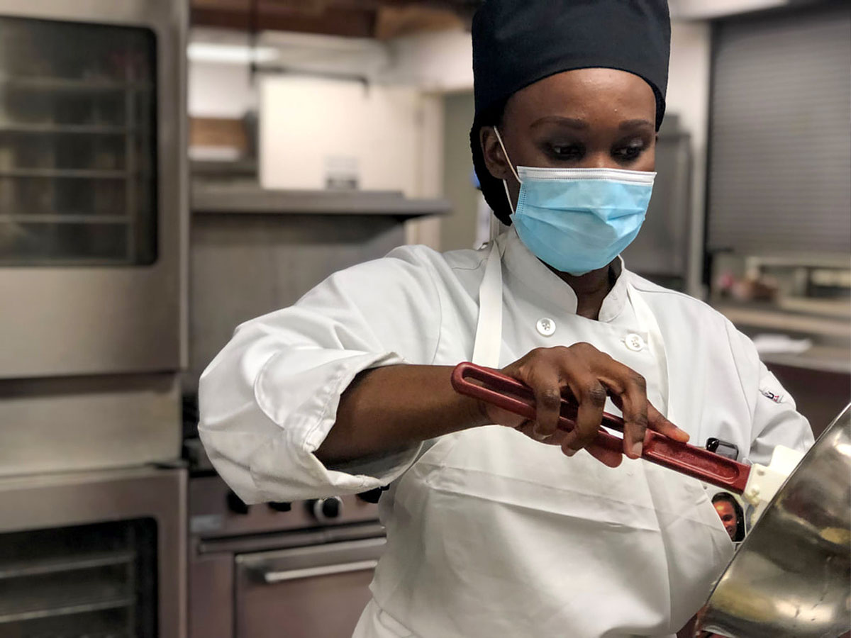Culinary students at Eva's Village