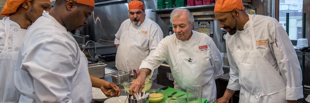 Jacques P&eacute;pin working with culinary students at NECAT