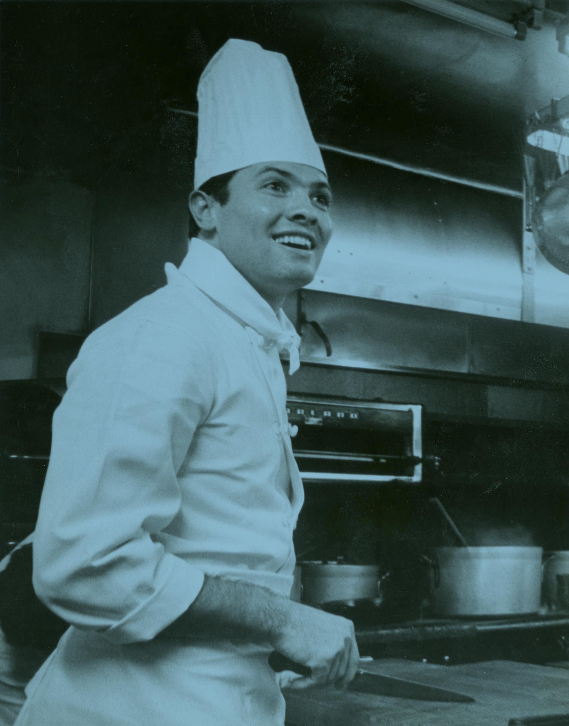 Young Jacques Pépin in the kitchen