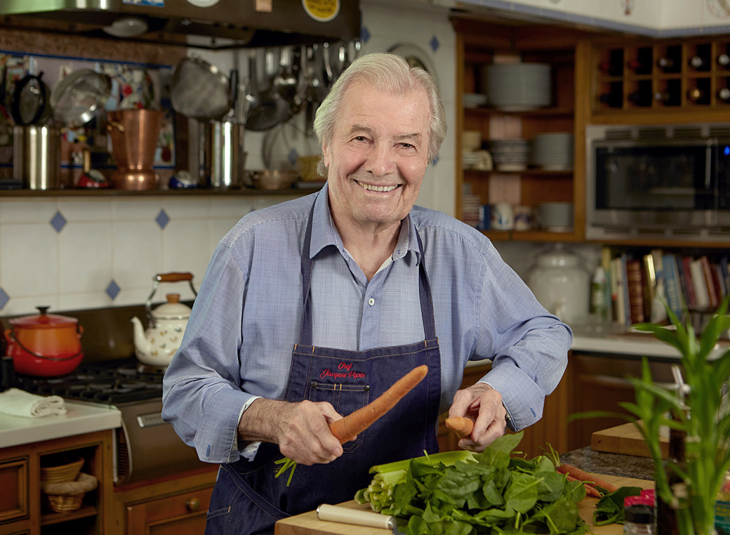 Jacques Pepin cooking in his home kitchen