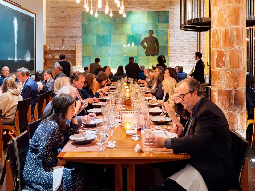 Guests at a 90/90 Dinner at Craft restaurant