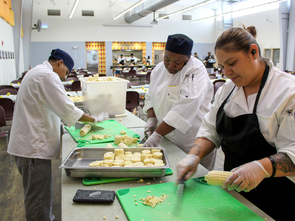 Culinary students at Cathedral Kitchen prepping food