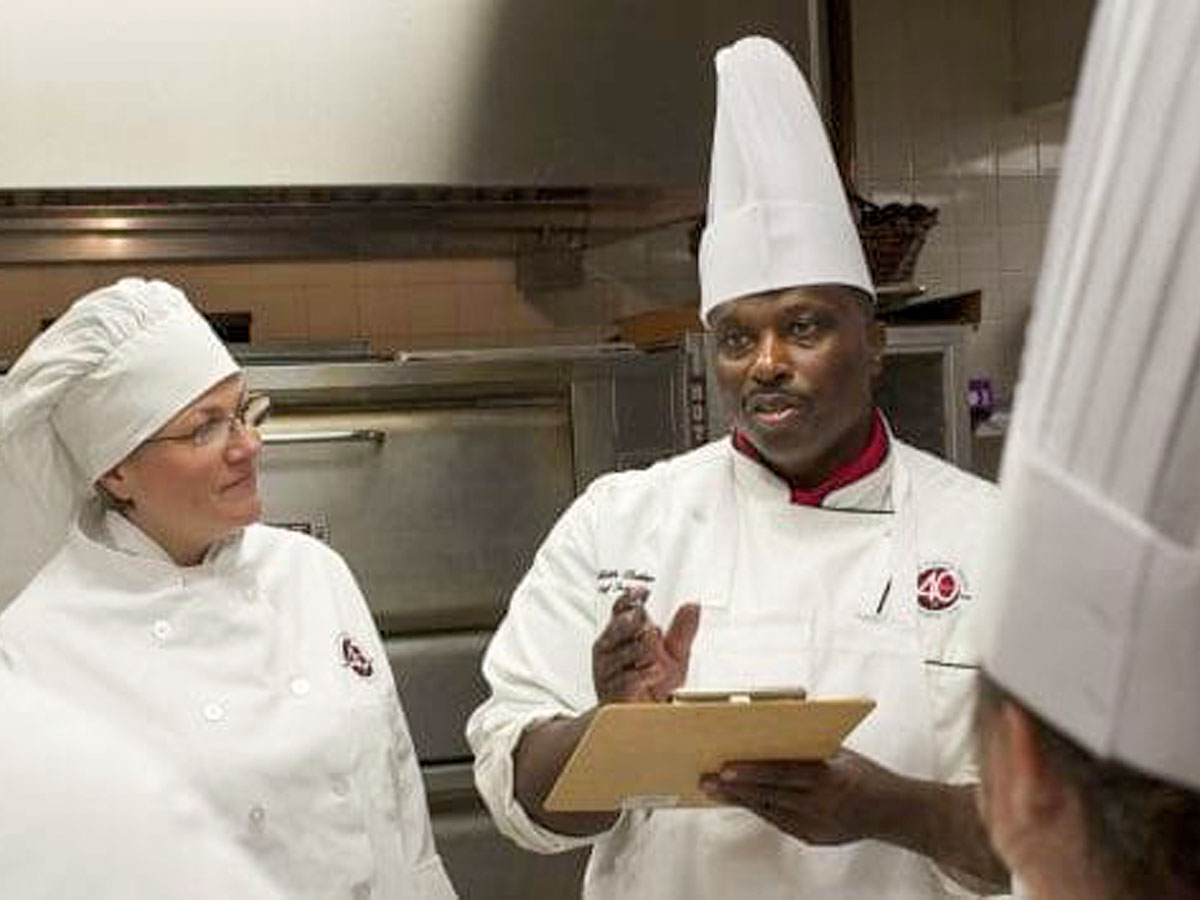 Culinary instructor and students at Bidwell Training Center