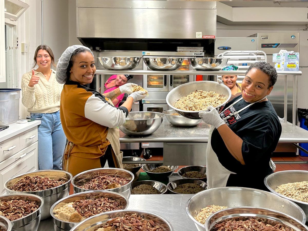 Chefs in the kitchen at Together We Bake