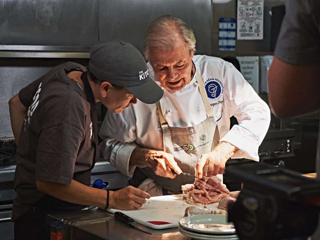 Jacques Pepin mentoring a culinary student