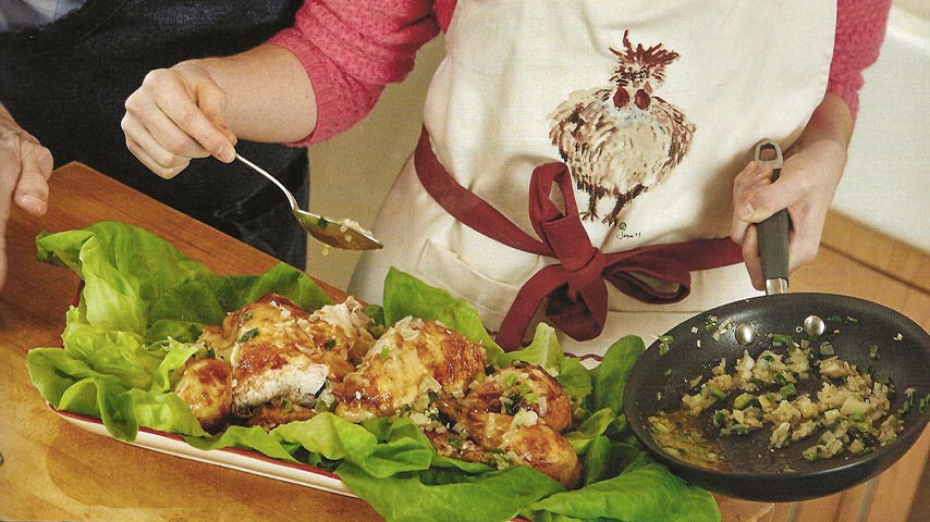 Jacques Pepin working in the kitchen with granddaughter Shorey